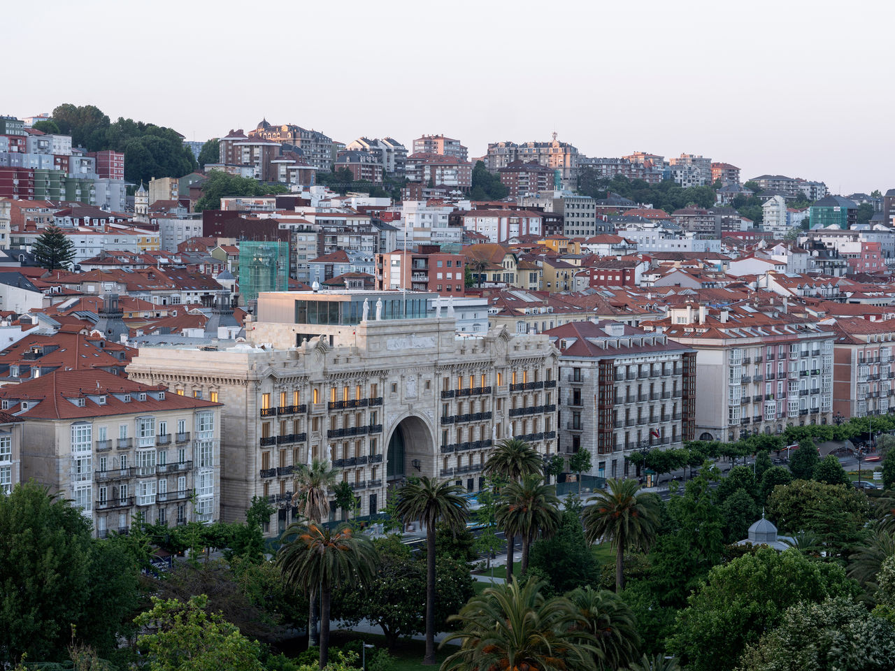 Aerial view of the facade of the Pereda Building and the urban center of Santander for the press release of the opening of Faro Santander.
